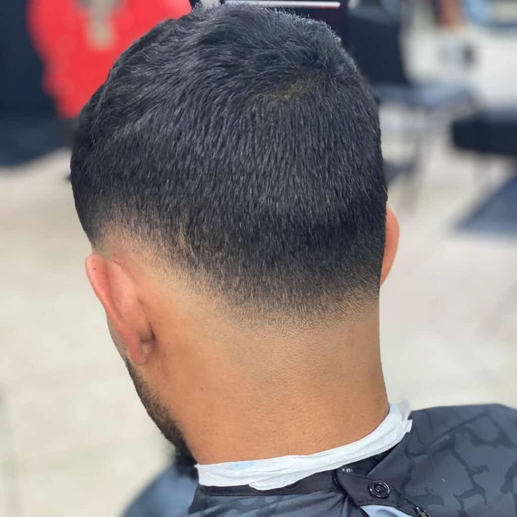 A Man with a Low-Fade Haircut