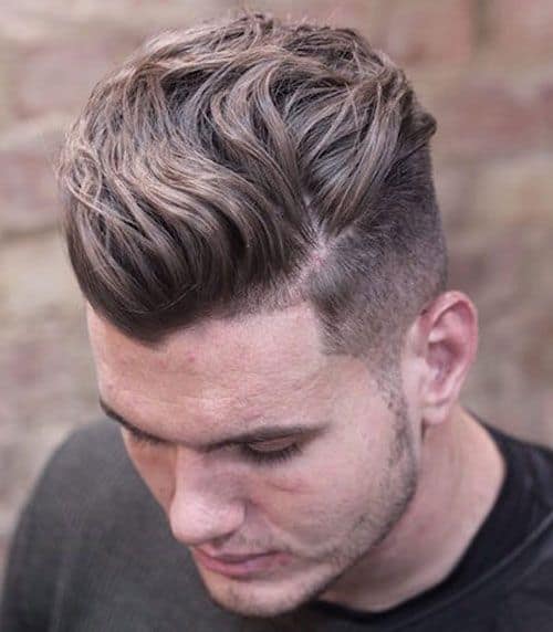 A Brunet Man with a Wavy Fade Haircut
