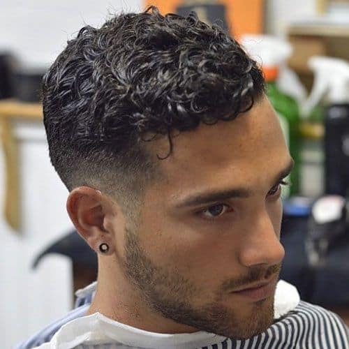 A Man with a Wavy Fade Haircut